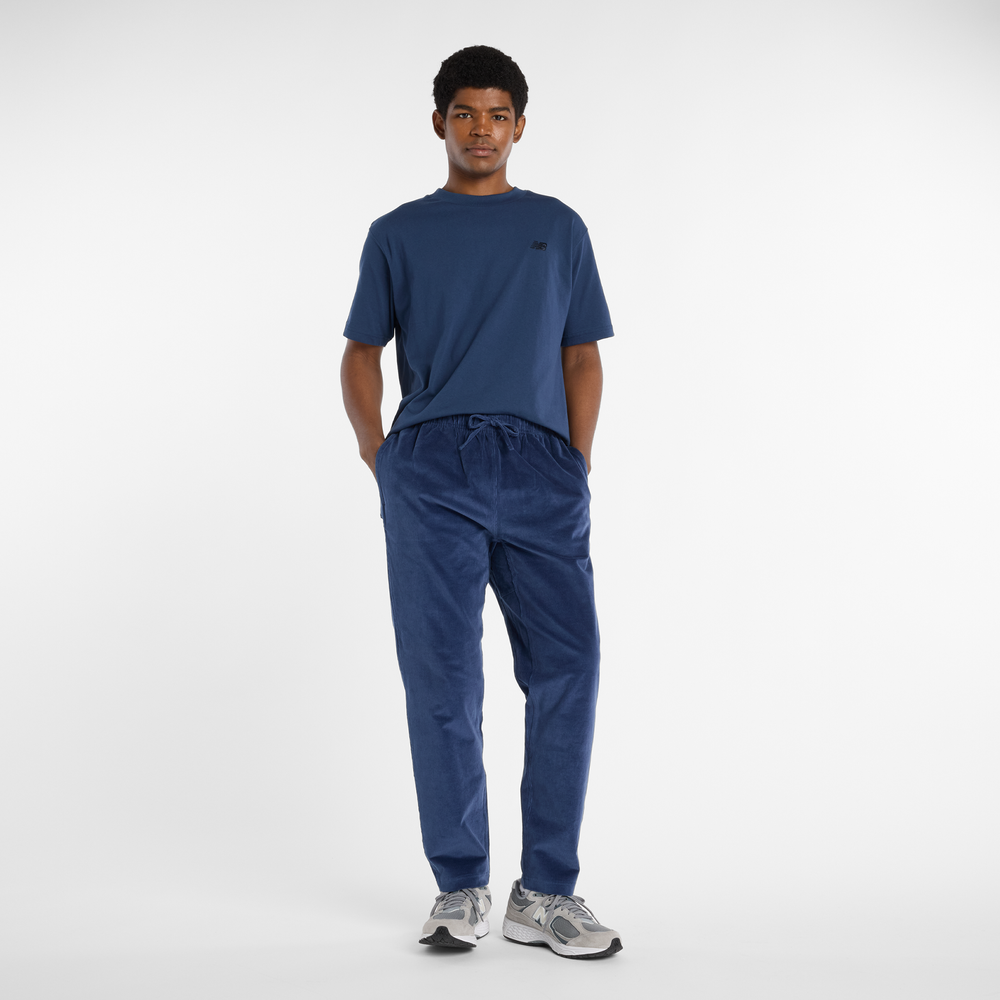 Pánské kalhoty New Balance MP53521NNY – tmavomodrá