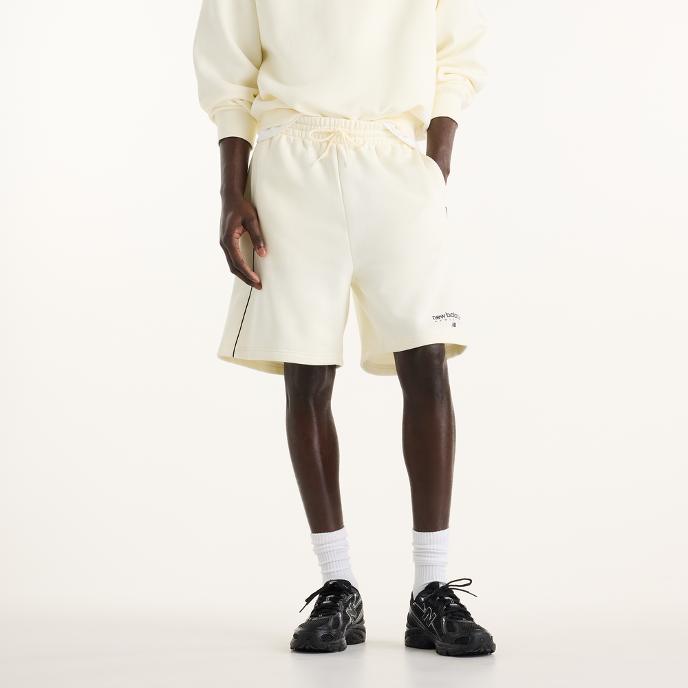 Pánské šortky New Balance MB62L72AAGA – béžové