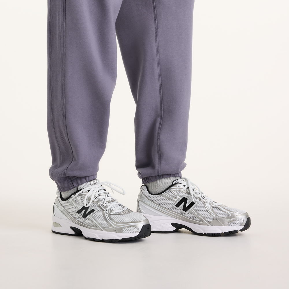 Pánské kalhoty New Balance MP41508AA9 – fialové