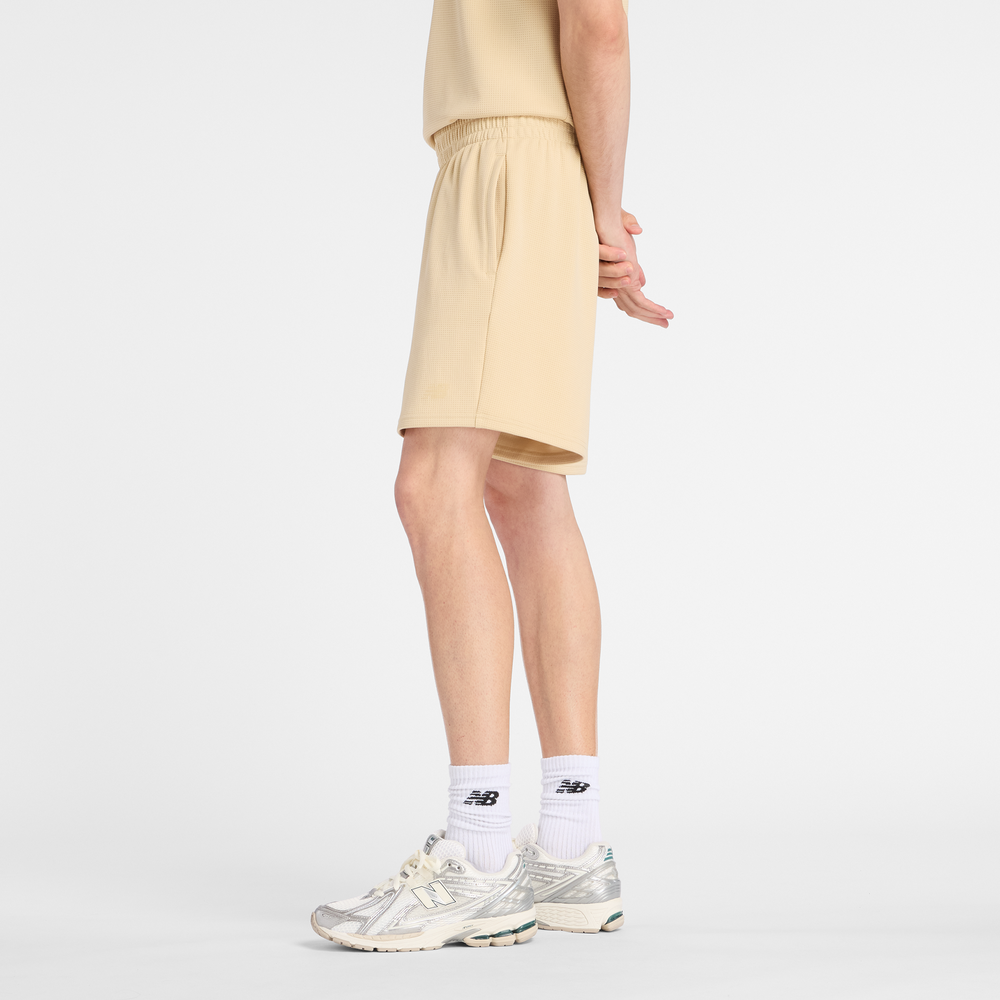 Pánské šortky New Balance MB61V17CABC – žluté