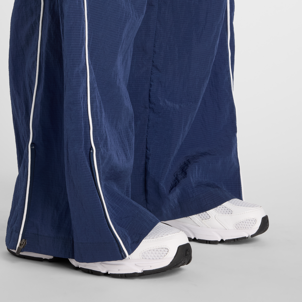 Dámské kalhoty New Balance WB61Z1E6NNY – tmavomodrá