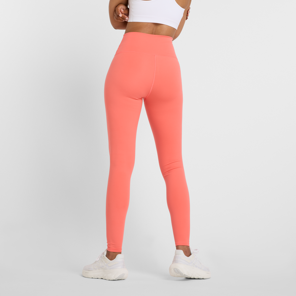 Dámské legíny New Balance WP51126DTR – oranžová