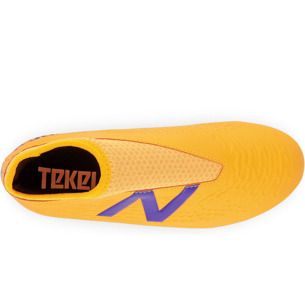 Kopačky New Balance TEKELA V3+ JNR MAGIQUE FG JST3FD35 – oranžová