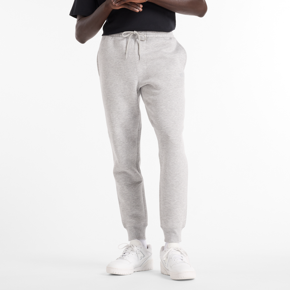 Pánské kalhoty New Balance MP43904AG – šedé