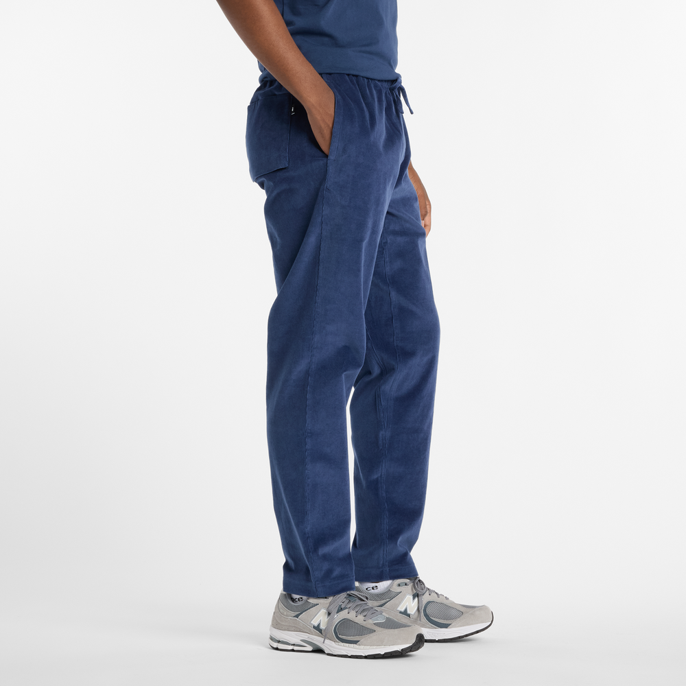 Pánské kalhoty New Balance MP53521NNY – tmavomodrá