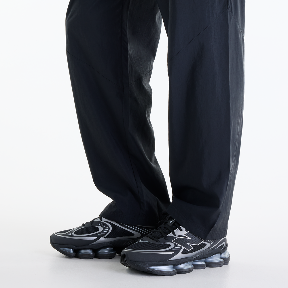 Pánské kalhoty New Balance Sport Legacy – černé