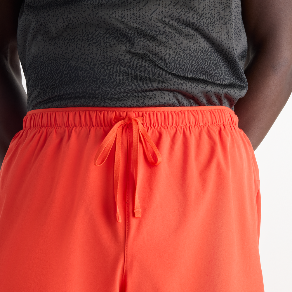 Pánské šortky New Balance RC Essential – oranžová