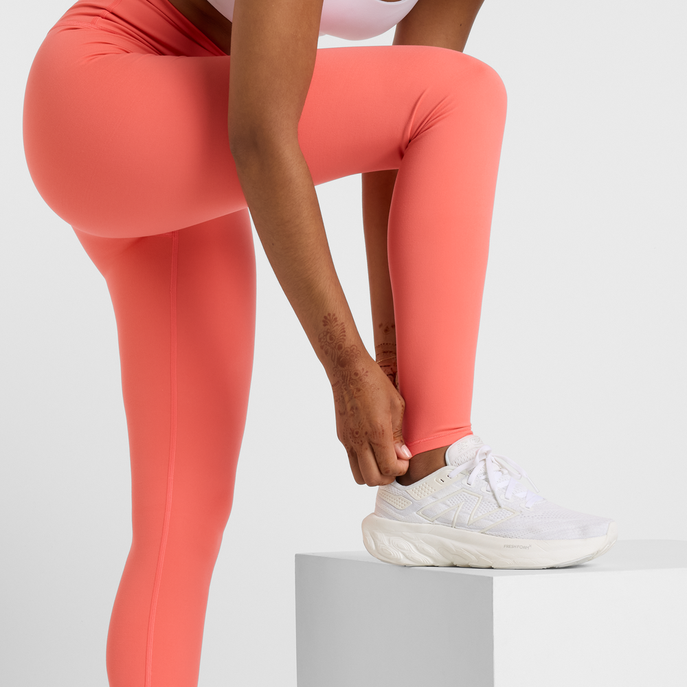 Dámské legíny New Balance WP51126DTR – oranžová