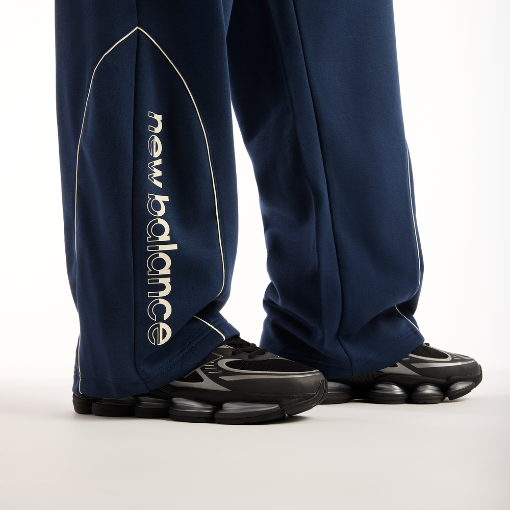 Pánské kalhoty New Balance Trackside Pants – tmavomodrá