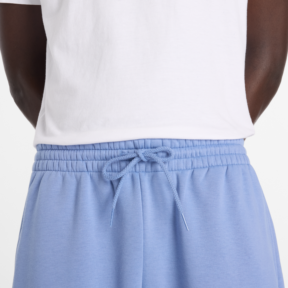 Pánské kalhoty New Balance MB61E74AAA3 – modré