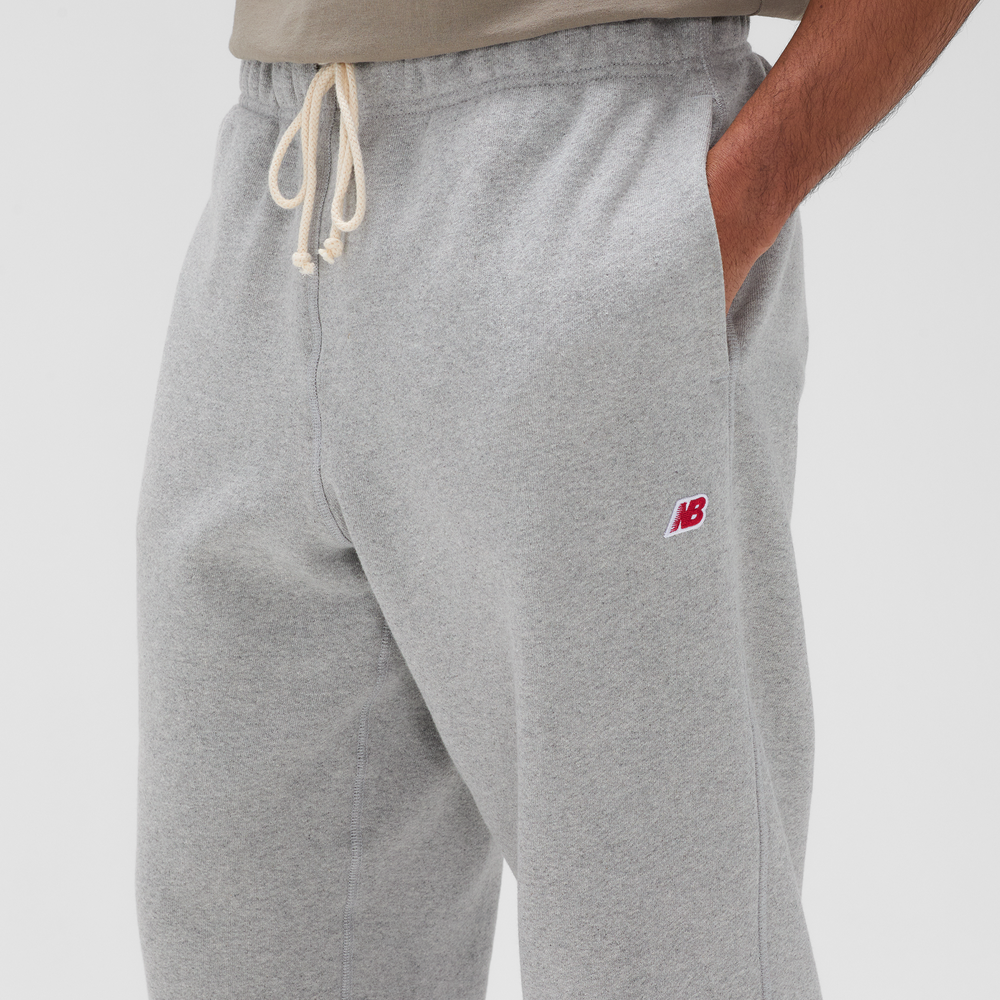 Pánské kalhoty New Balance MADE in USA MP43547AG – šedé