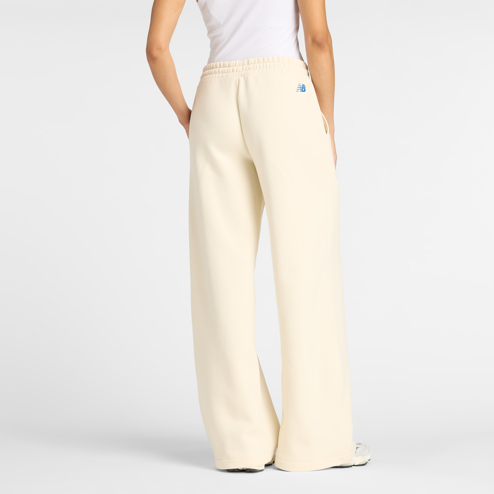 Dámské kalhoty New Balance WP53903LIN – béžové