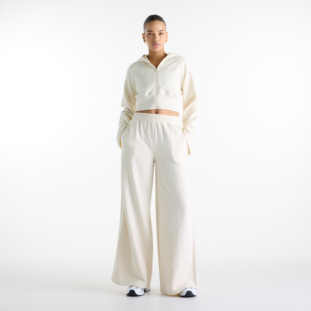 Dámské kalhoty New Balance Brushed Coastal – béžové