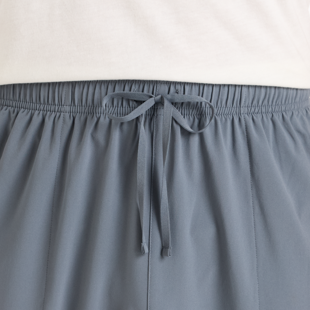 Pánské kalhoty New Balance MP51904GT – šedé