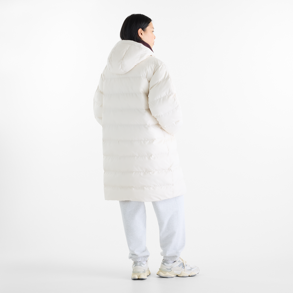 Dámská bunda New Balance Boston Long Puffer – béžové