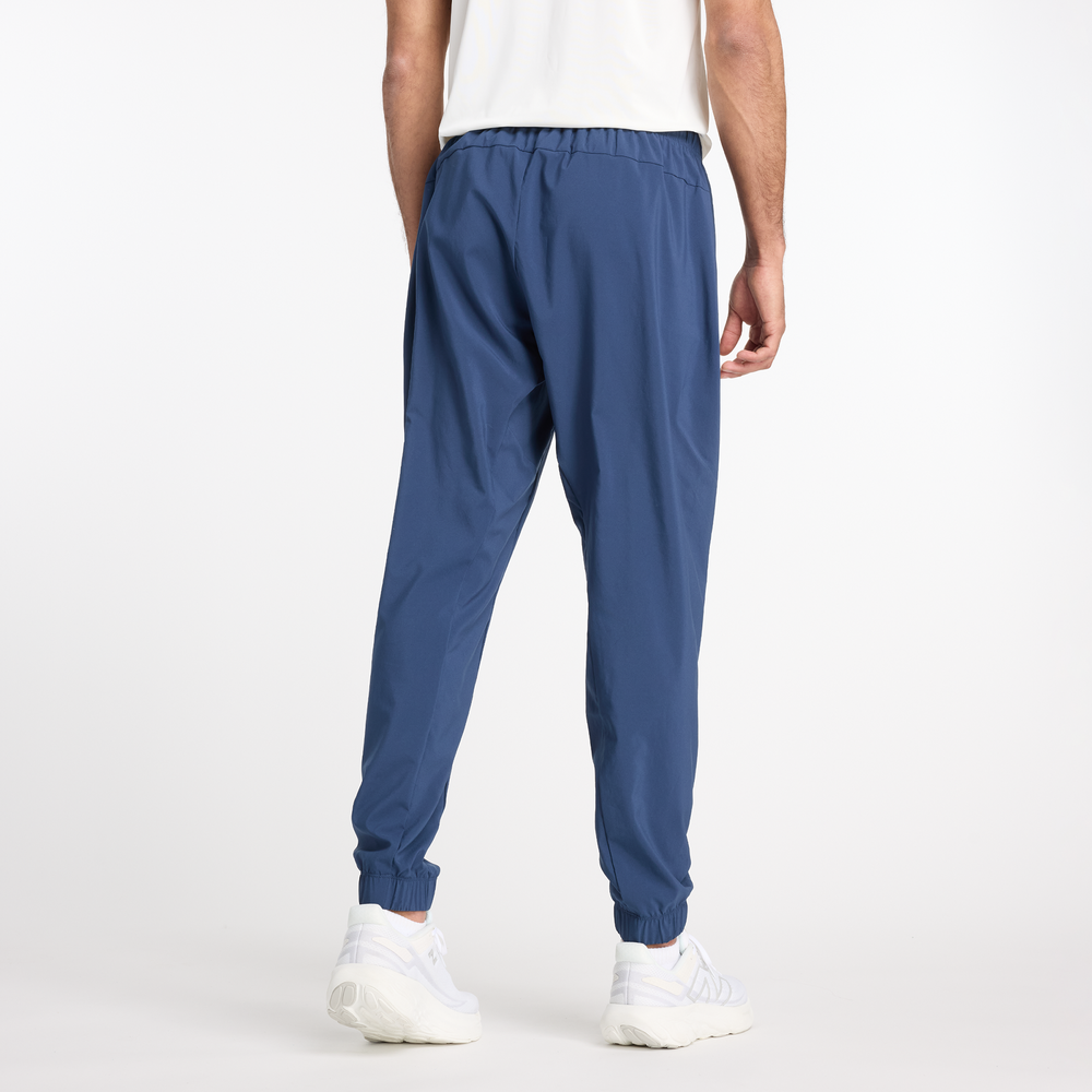 Pánské kalhoty New Balance MP41011NNY – tmavomodrá