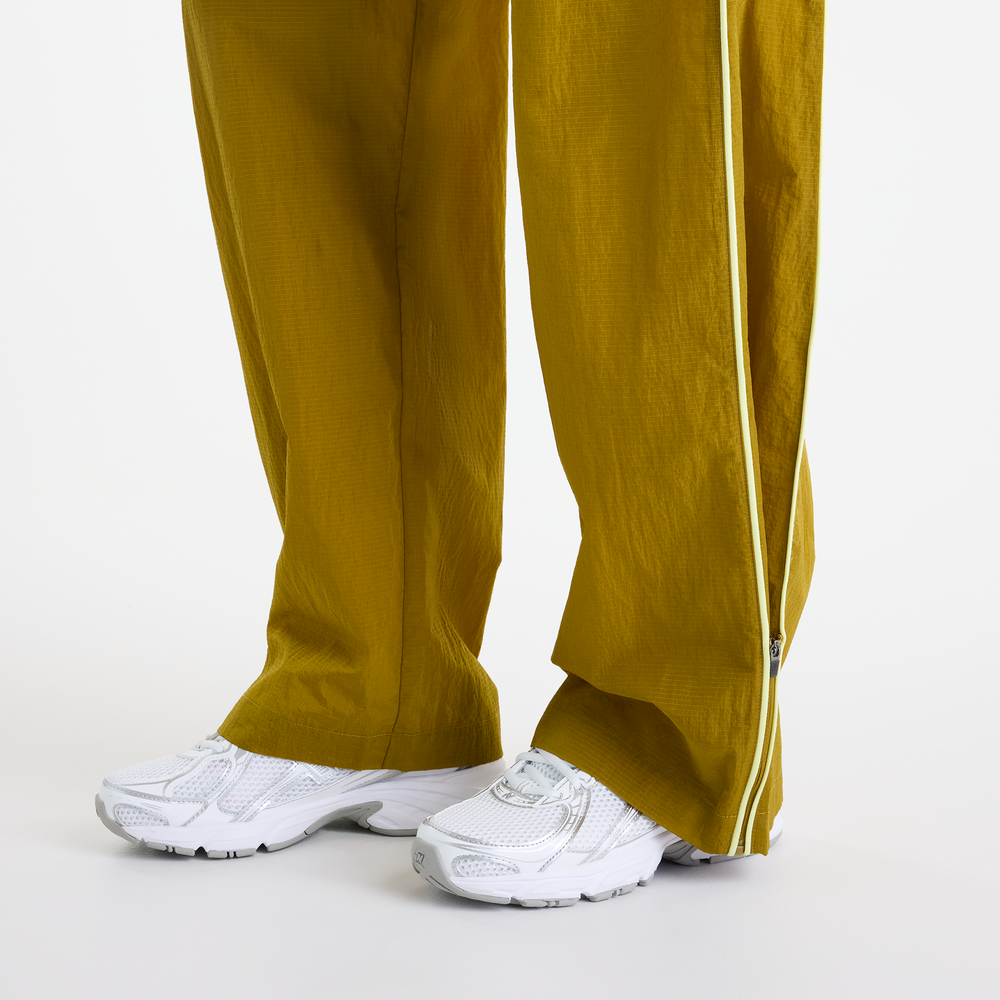Dámské kalhoty New Balance Sport Legacy – žluté