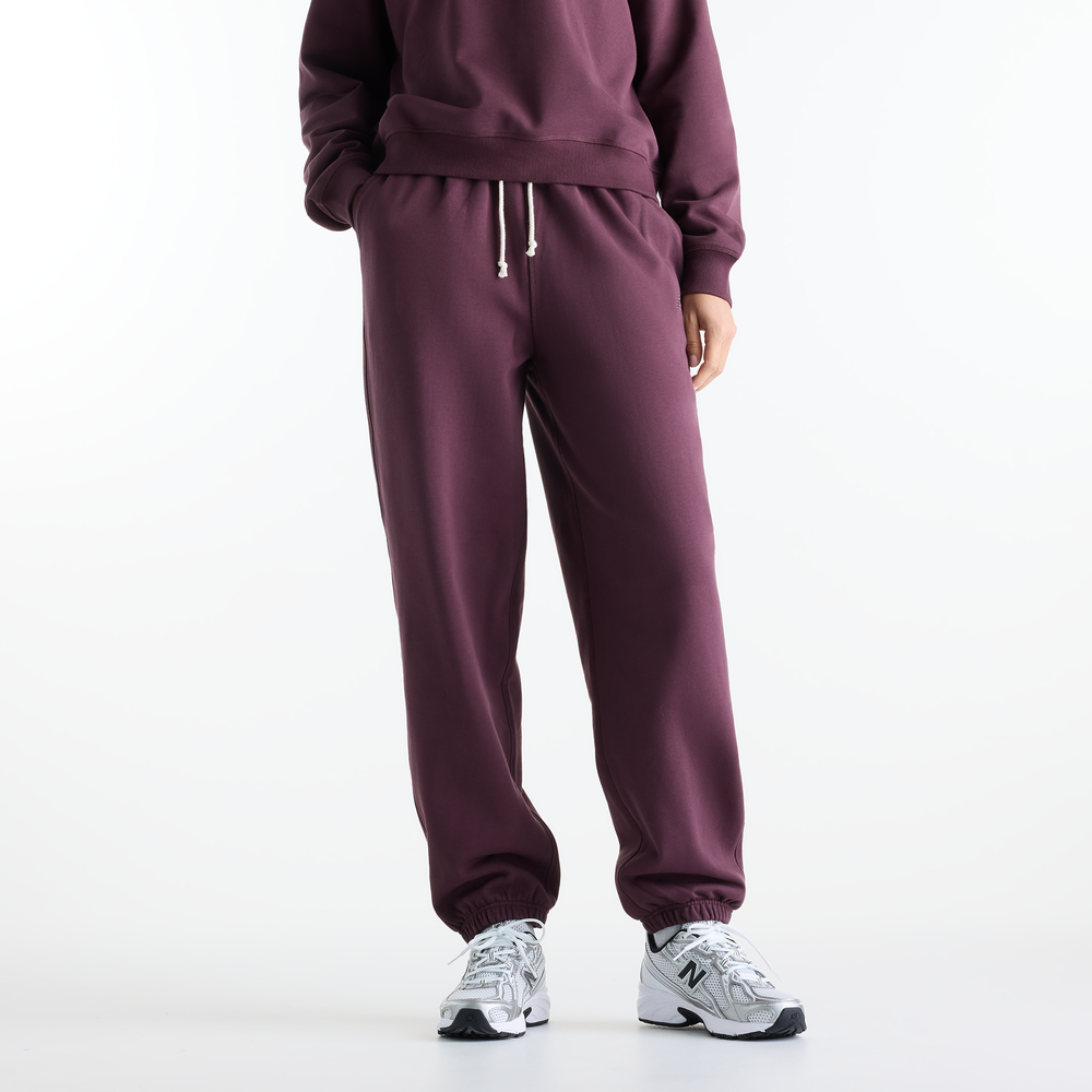 Dámské kalhoty New Balance WP41513YLR – fialové