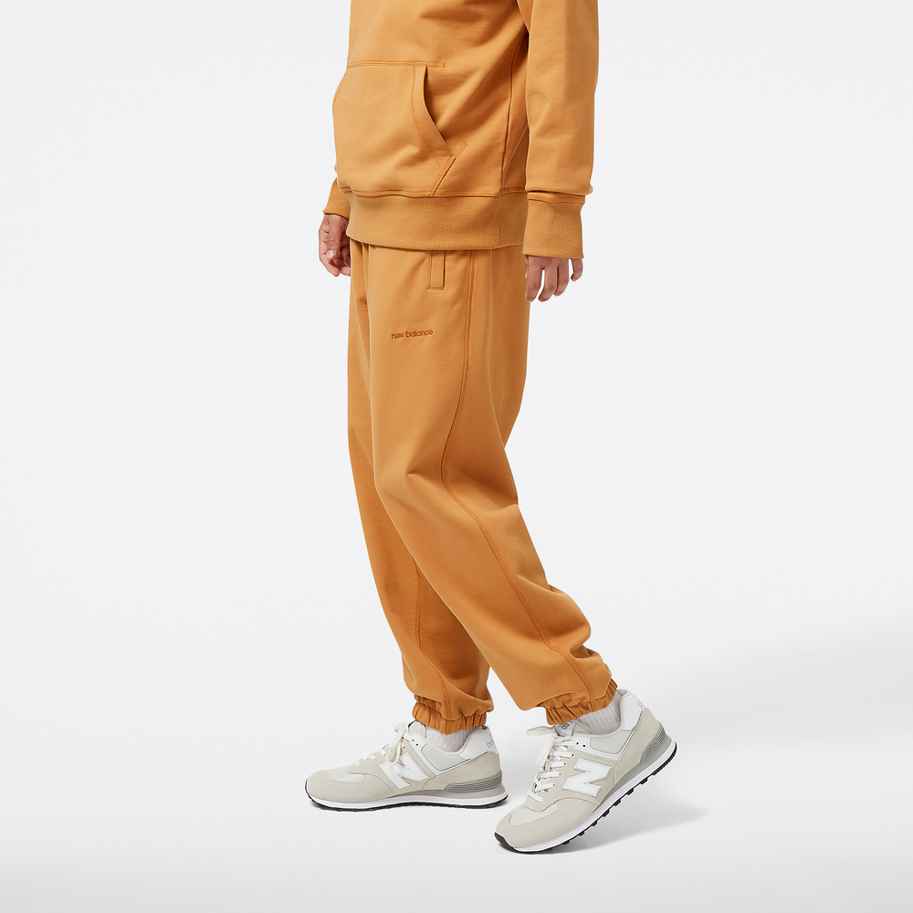 Pánské kalhoty New Balance MP23551TOB – oranžová