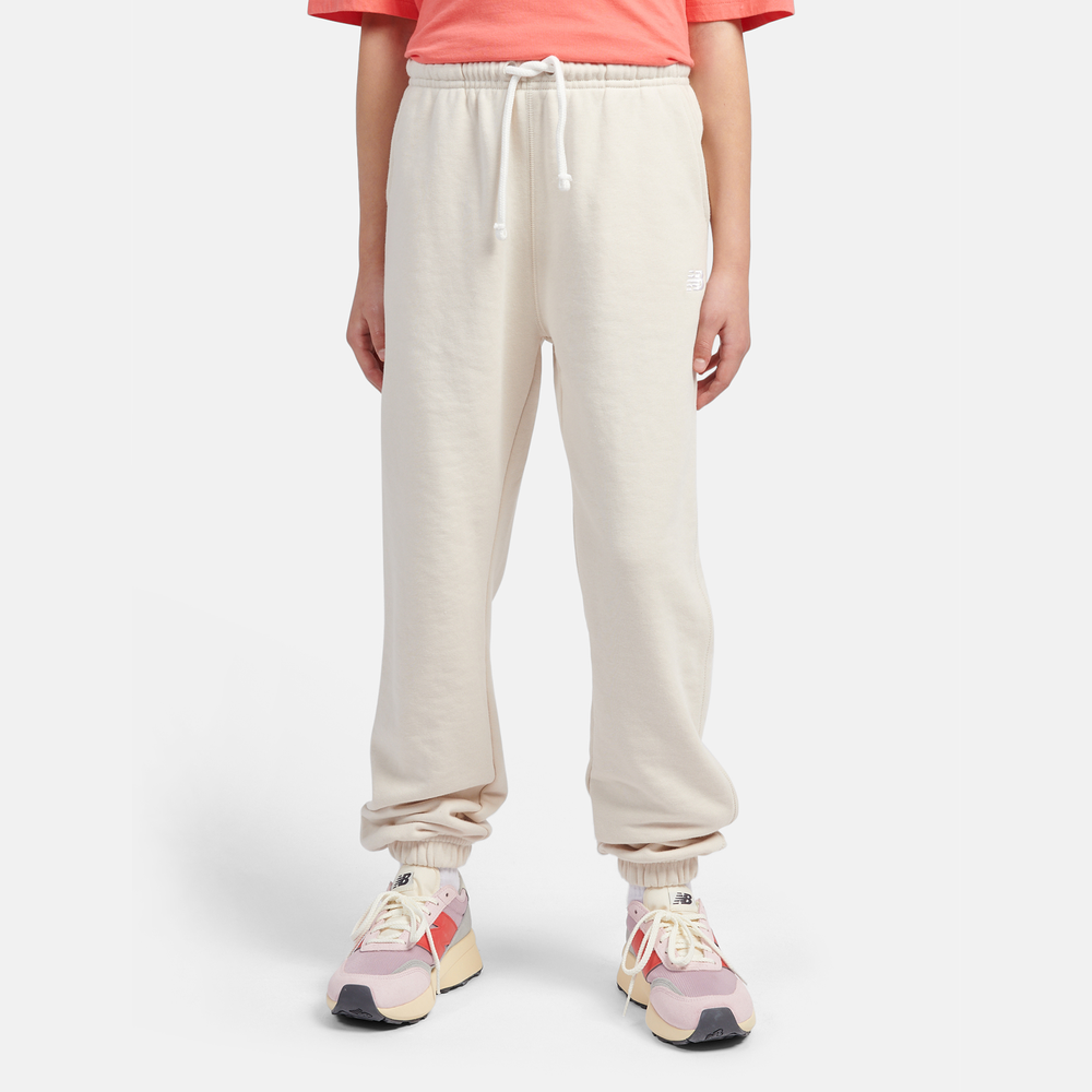 Dětské kalhoty New Balance LAKG0058LIN – béžové