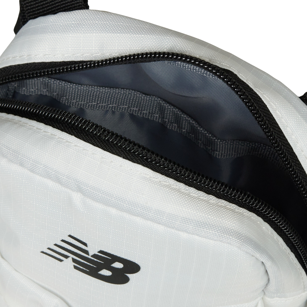 Ledvinka New Balance LAB51901WT – bílé