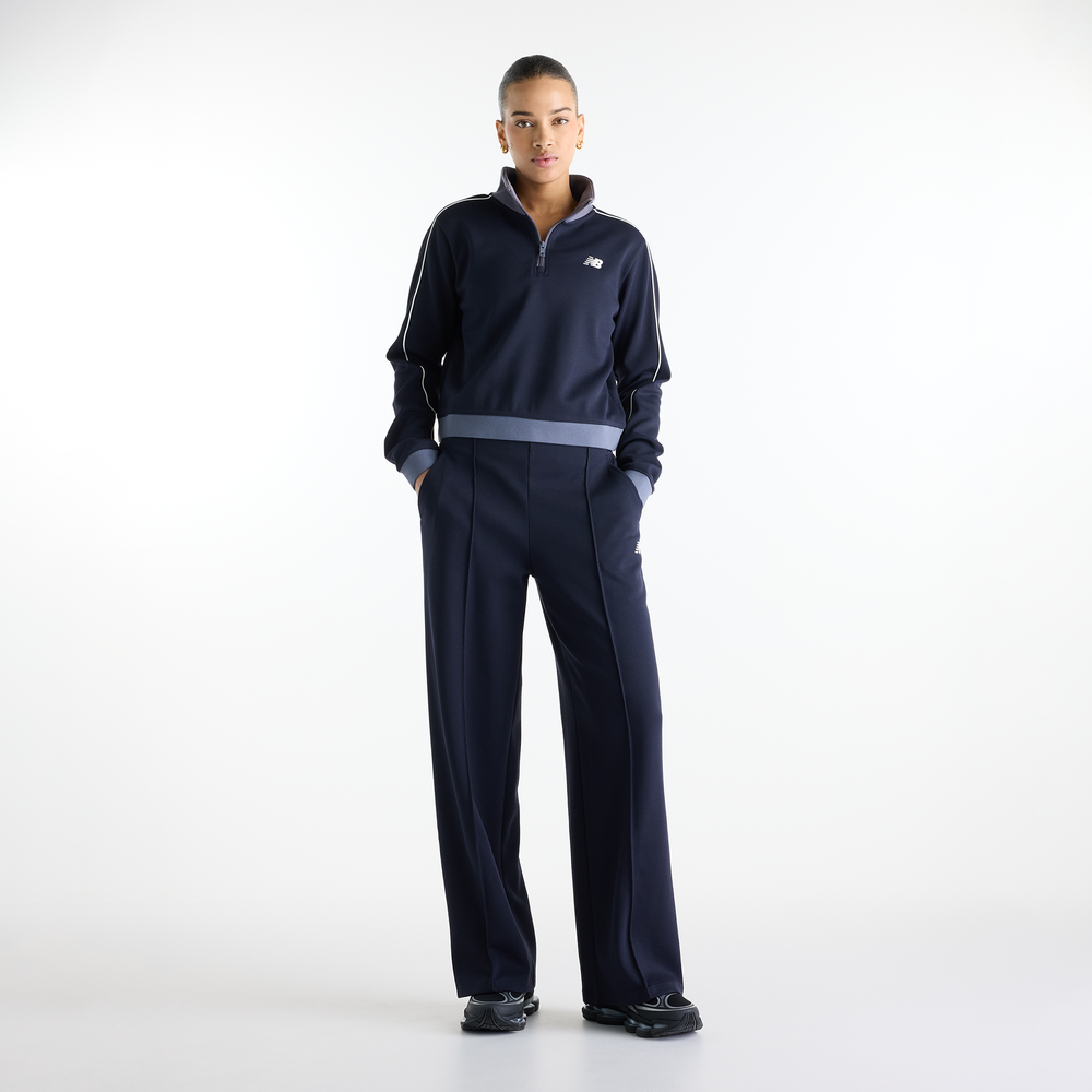Dámské kalhoty New Balance Sport Legacy – tmavomodrá