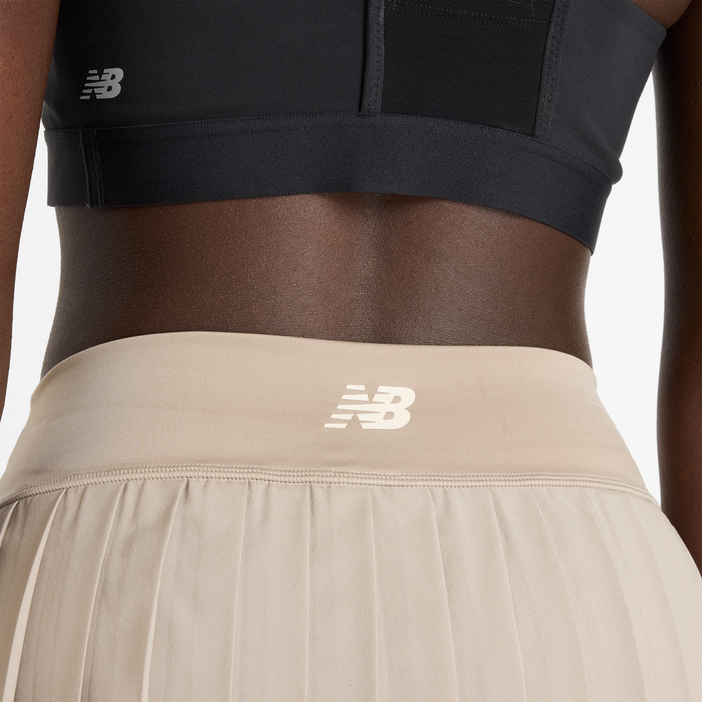 Dámská sukně New Balance WK51402ADS – béžové