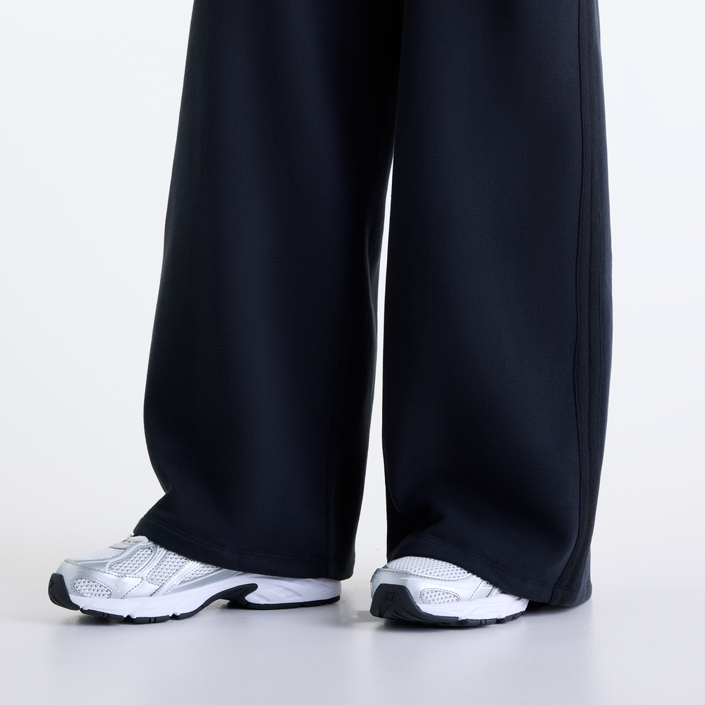 Dámské kalhoty New Balance Brushed Coastal – černé
