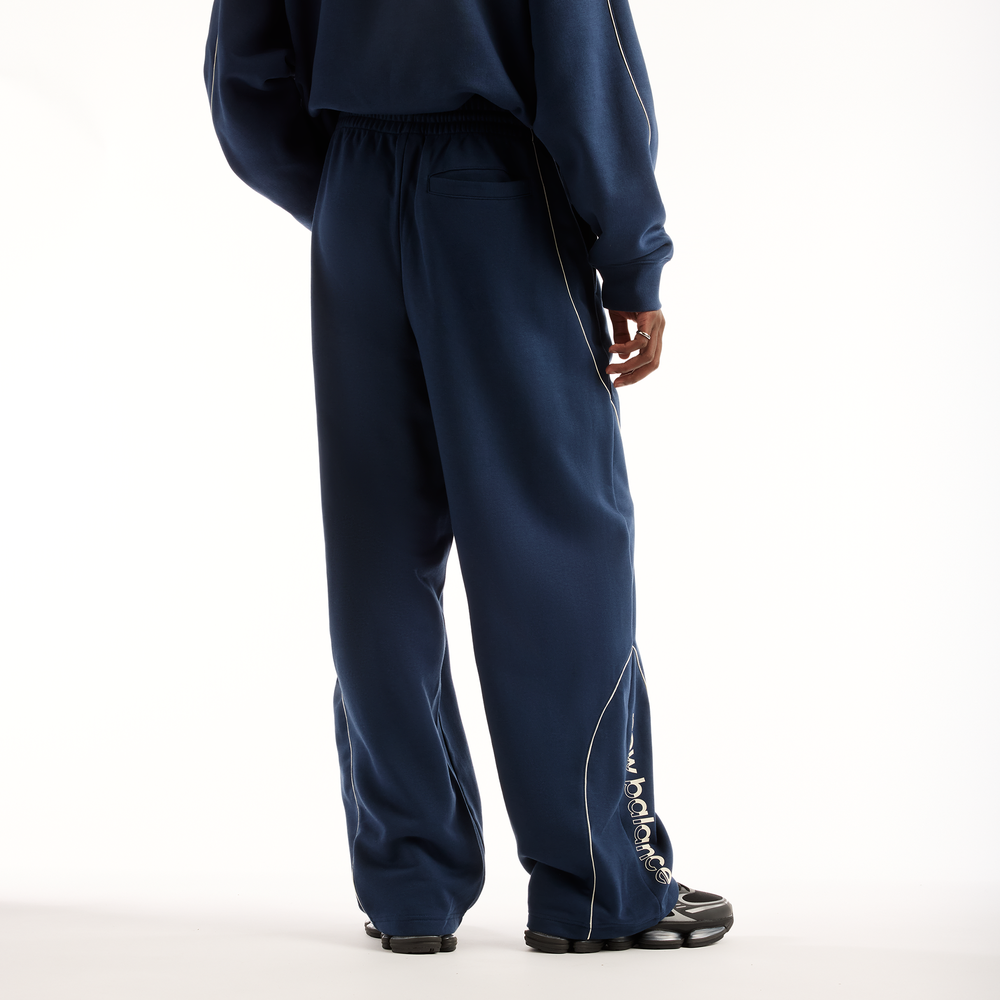 Pánské kalhoty New Balance Trackside Pants – tmavomodrá