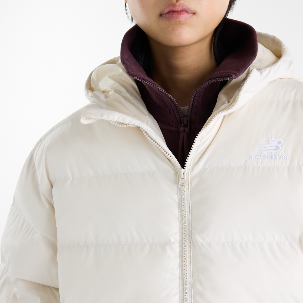 Dámská bunda New Balance Boston Long Puffer – béžové