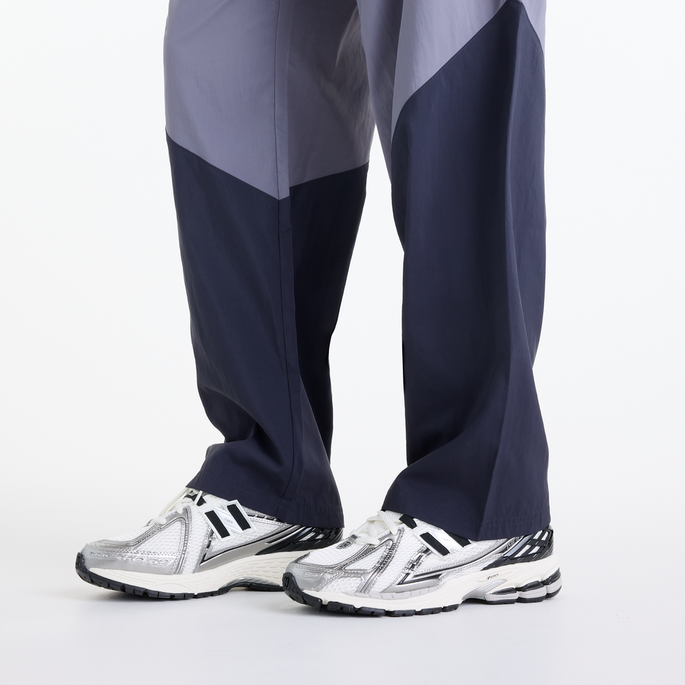 Pánské kalhoty New Balance Sport Legacy – fialové