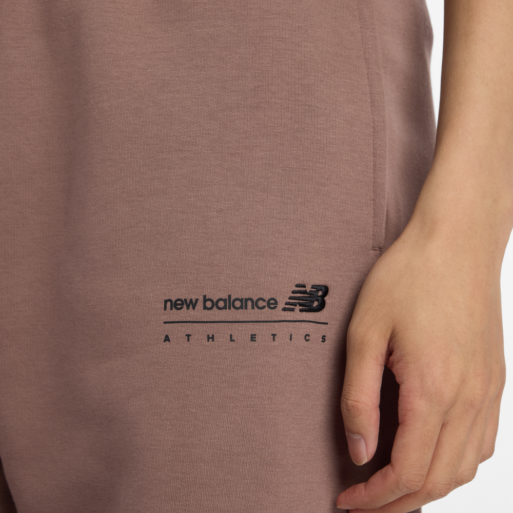 Pánské kalhoty New Balance MP53508EAS – hnědý