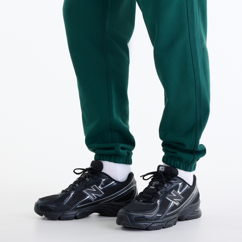 Pánské kalhoty New Balance Athletics – zelené