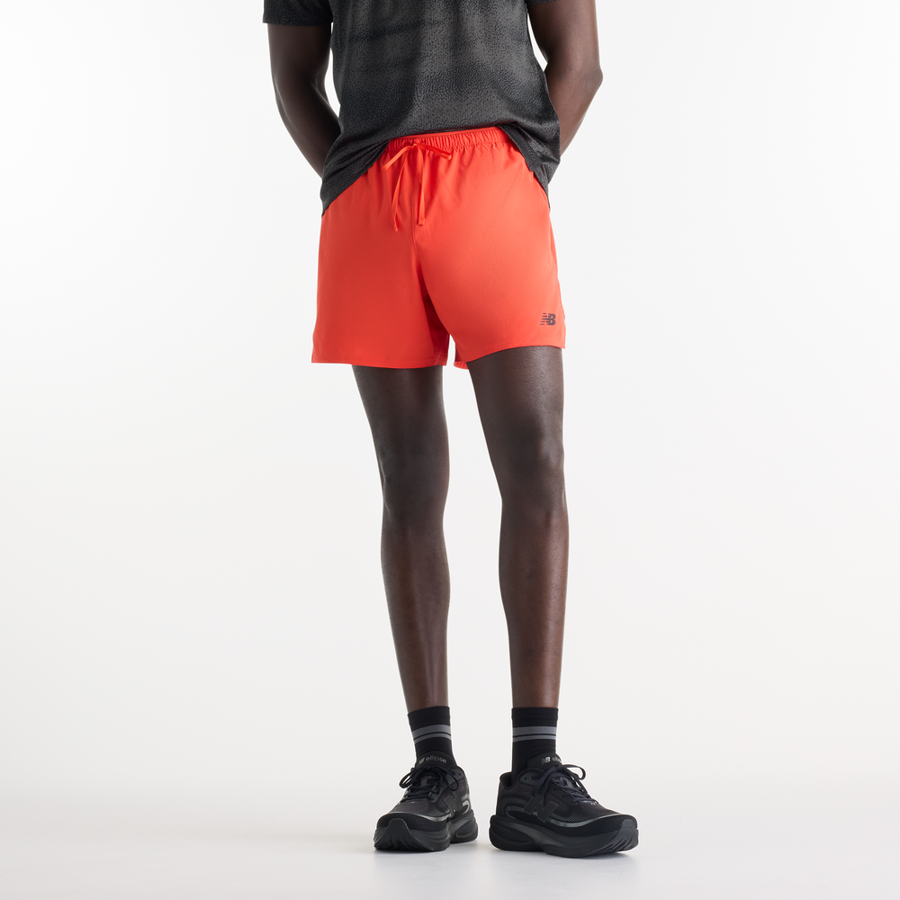 Pánské šortky New Balance MB6180TANEF – oranžová