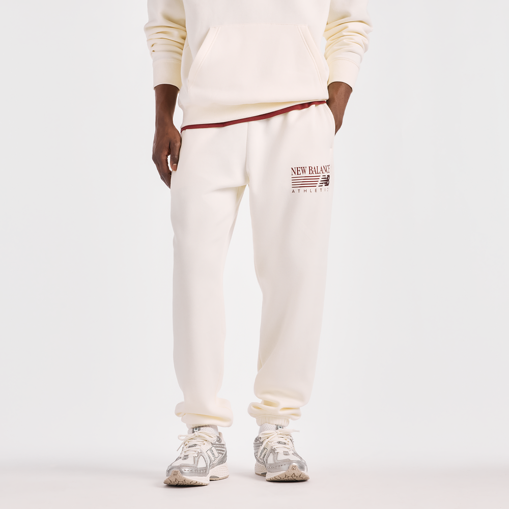 Pánské kalhoty New Balance MB62S1NTAGA – béžové