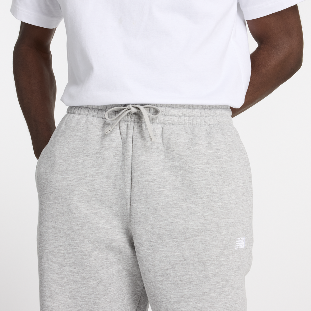 Pánské kalhoty New Balance MP41503AG – šedé