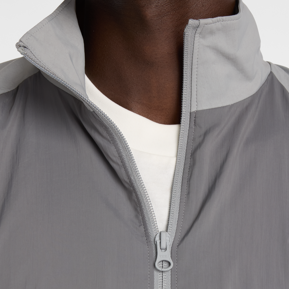 Pánská bunda New Balance MJ61J73YCAS – šedé