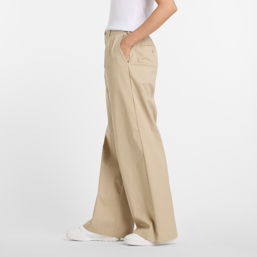 Dámské kalhoty New Balance WP51538SOT – béžové