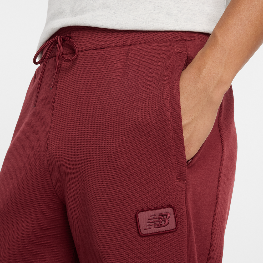 Pánské kalhoty New Balance MP53501MHB – bordó