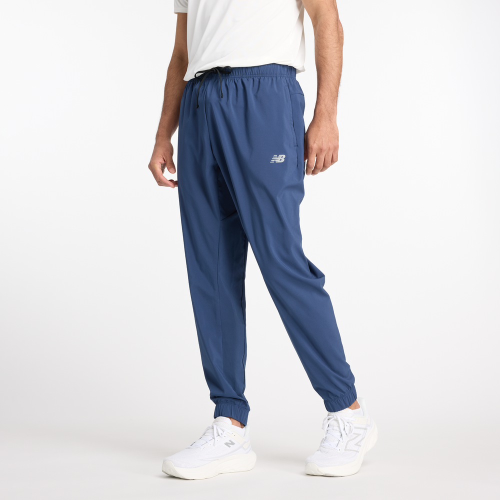Pánské kalhoty New Balance MP41011NNY – tmavomodrá