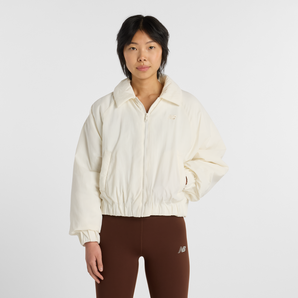 Dámská bunda New Balance WJ61D8YXSST​ – béžové