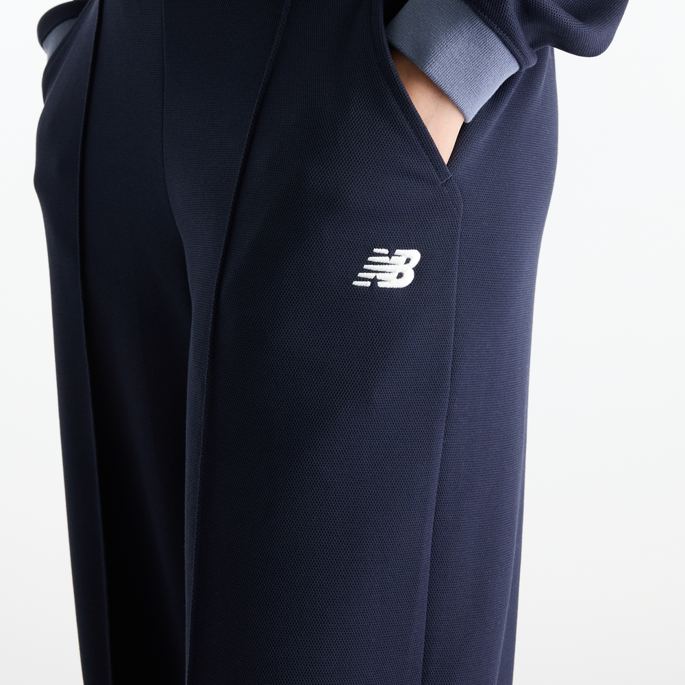 Dámské kalhoty New Balance Sport Legacy – tmavomodrá