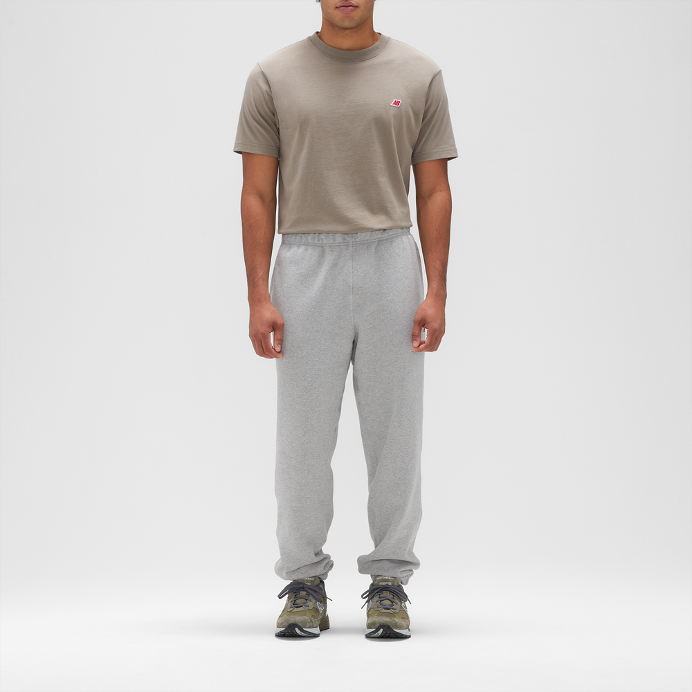 Pánské kalhoty New Balance MADE in USA MP43547AG – šedé