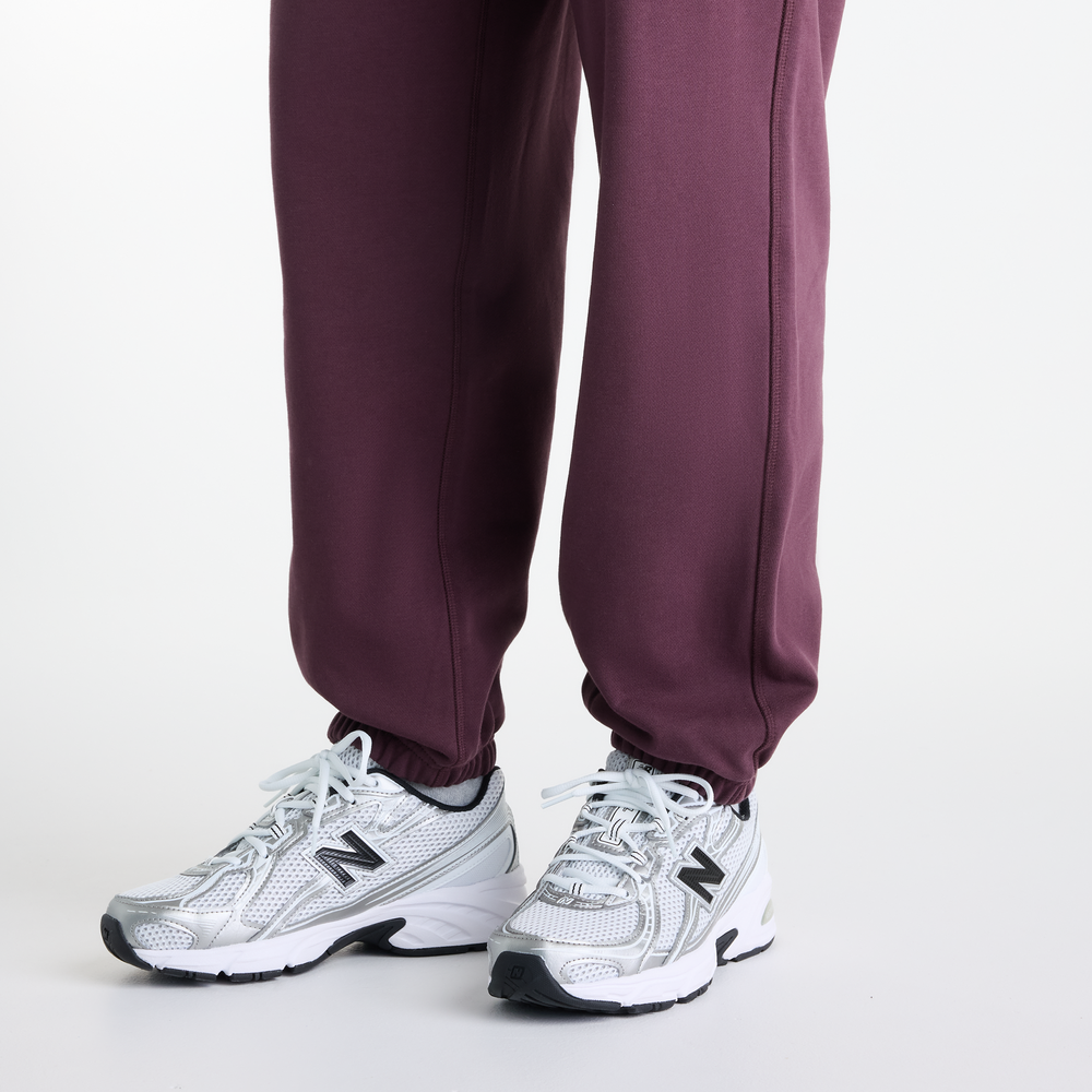 Dámské kalhoty New Balance Athletics – fialové
