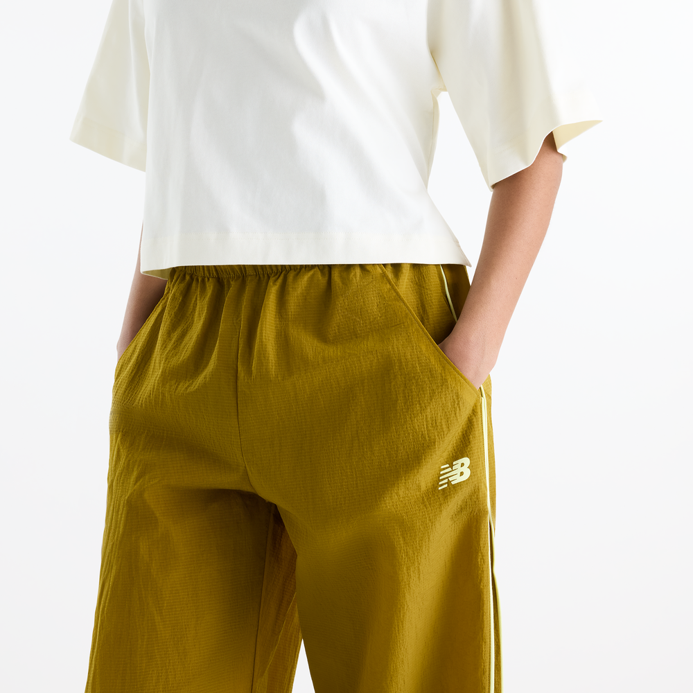 Dámské kalhoty New Balance Sport Legacy – žluté