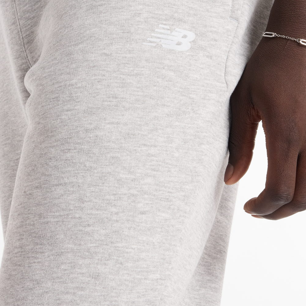 Pánské kalhoty New Balance MP43904AG – šedé