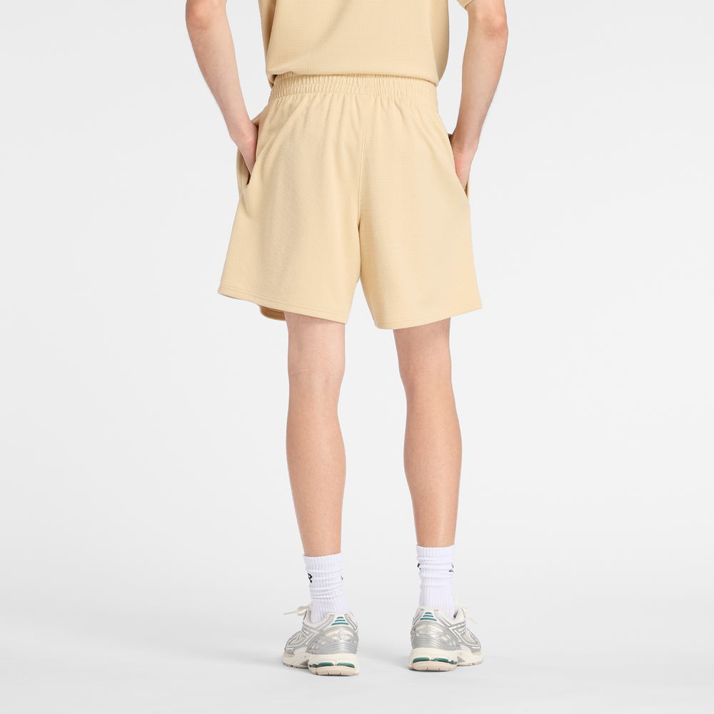 Pánské šortky New Balance MB61V17CABC – žluté