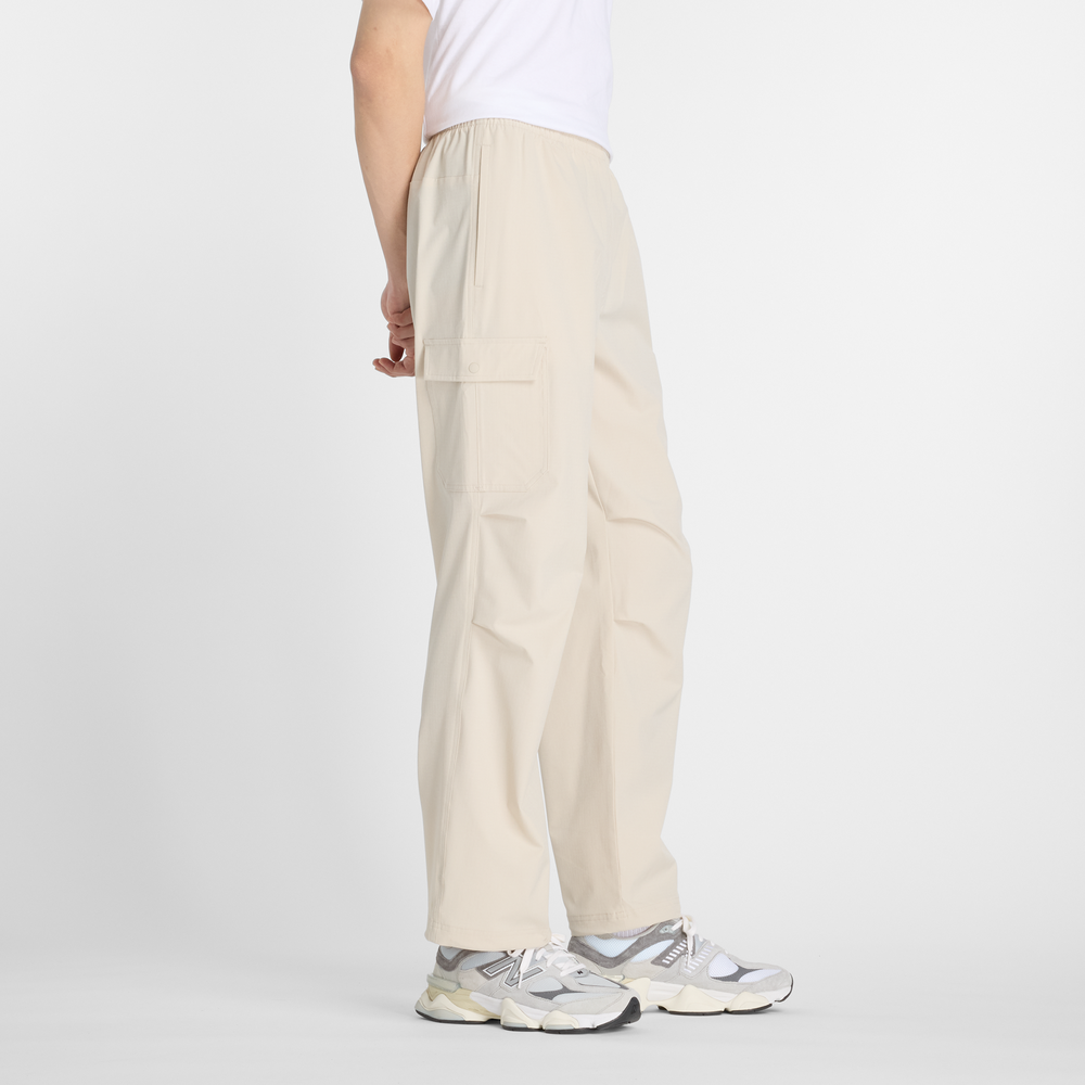 Pánské kalhoty New Balance MP51538TWF – béžové