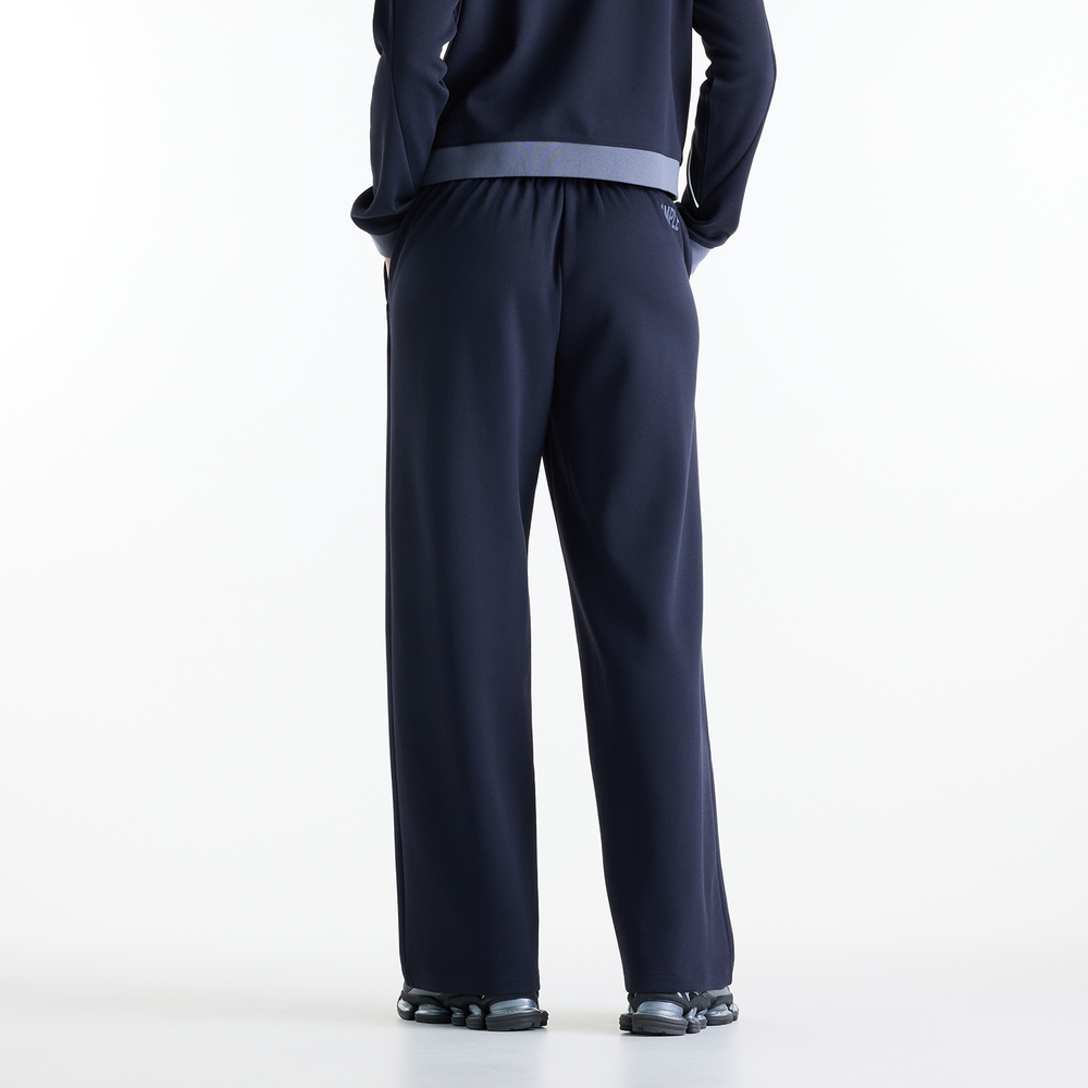 Dámské kalhoty New Balance Sport Legacy – tmavomodrá