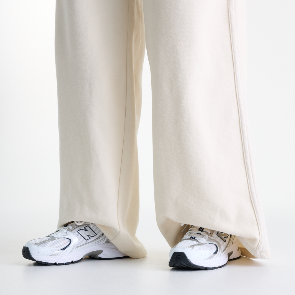 Dámské kalhoty New Balance Brushed Coastal – béžové